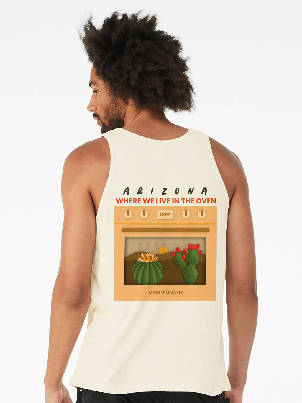 Person wearing a tank top with a back graphic of an oven with cacti in it, and text 'Arizona, where we live in the oven'