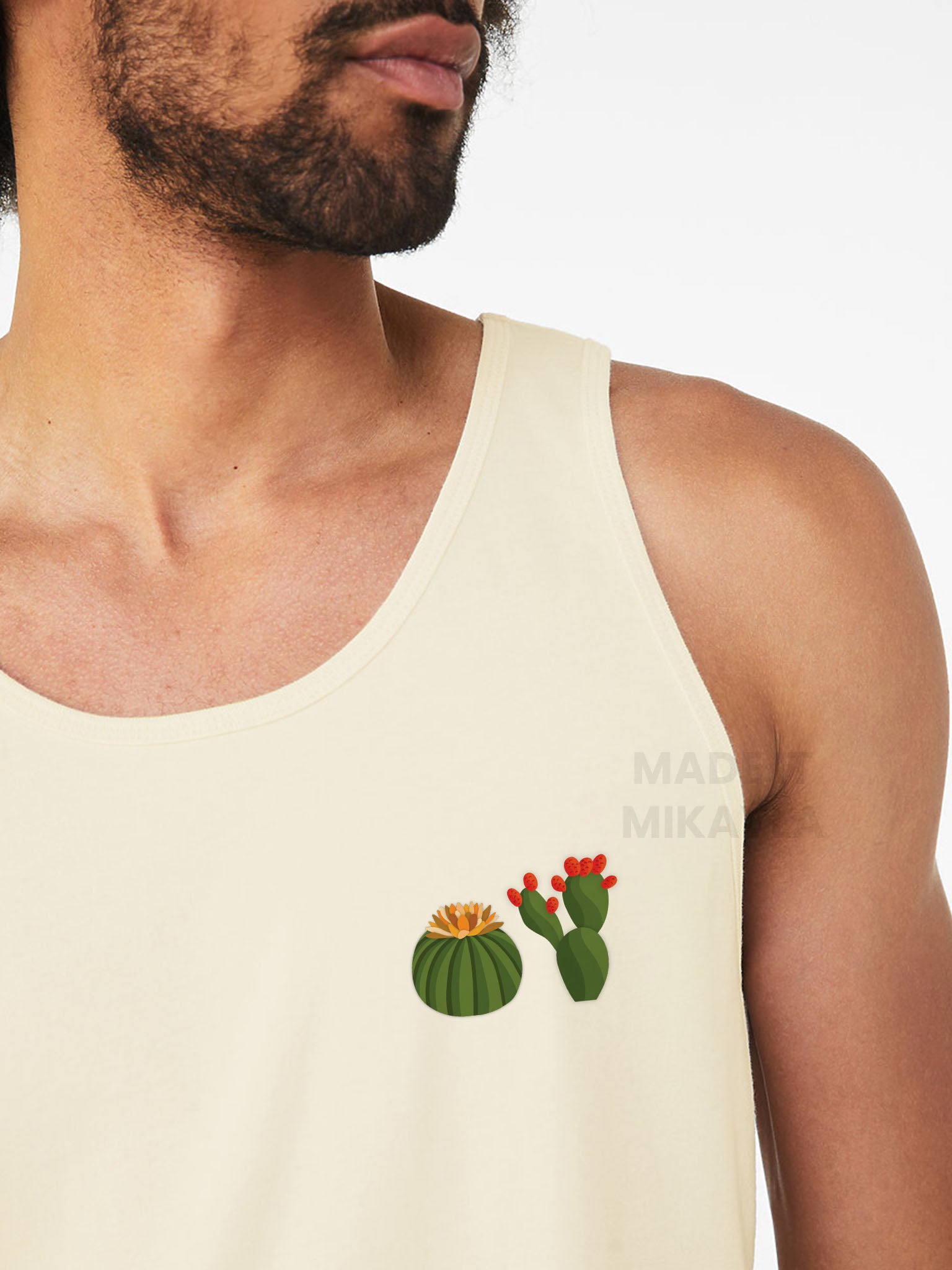 Close-up of person wearing a beige tank top with cactus design on a white background