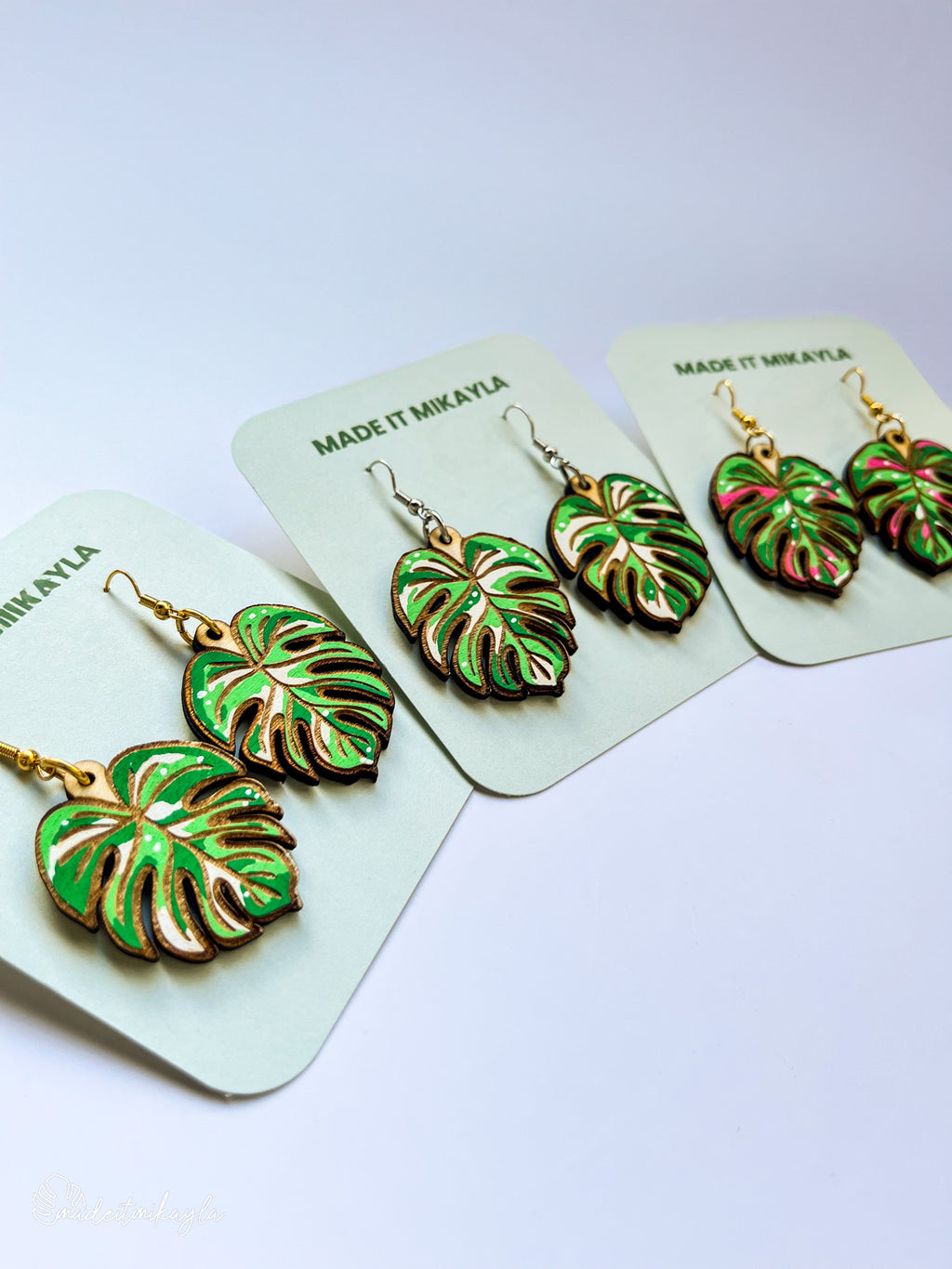 Three pairs of green and white Variegated Monstera Leaf Earrings