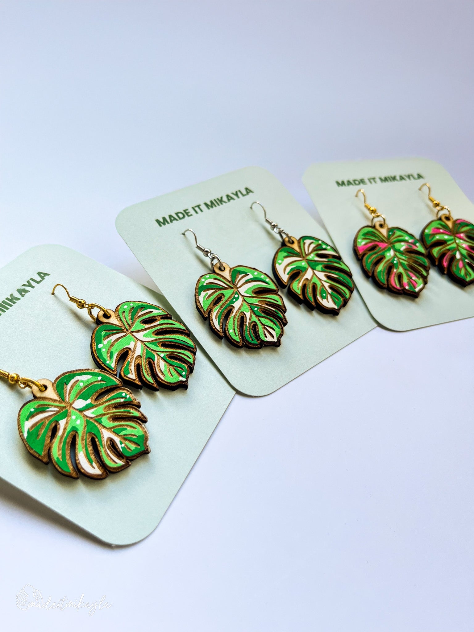 Three pairs of green and white Variegated Monstera Leaf Earrings
